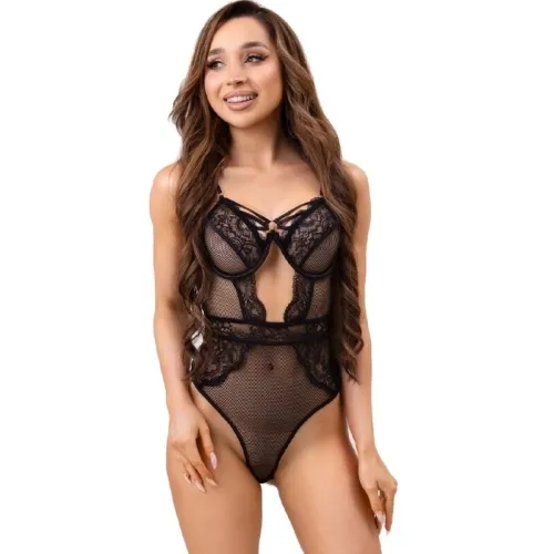 Woman in black lace bodysuit, smiling, with long, wavy hair against a white background.