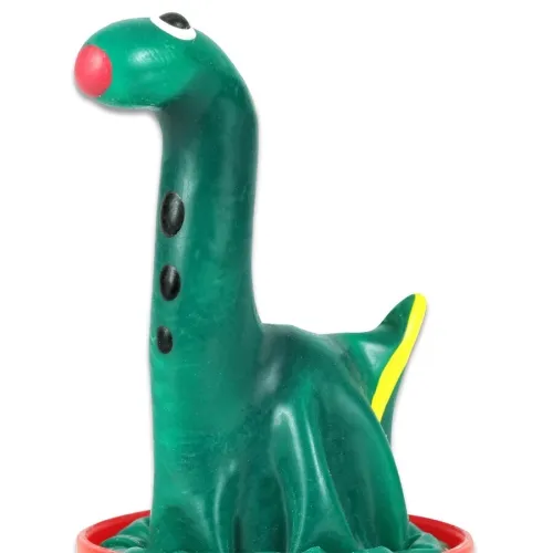 Grüne Dinosaurierfigur mit roter Nase und schwarzen Punkten, steht in einem roten Behälter.