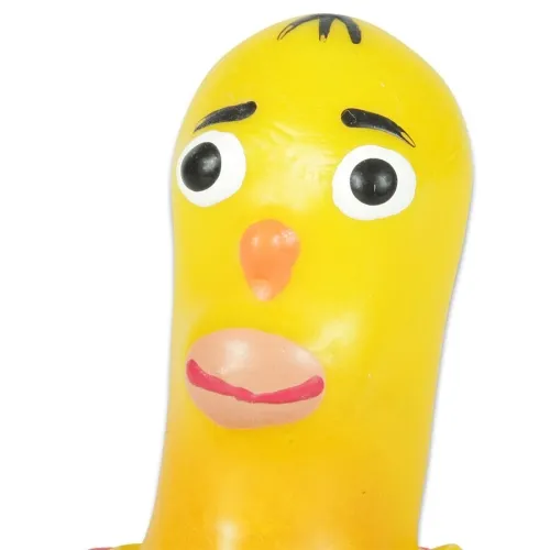 Yellow rubber chicken with large eyes and a surprised facial expression.