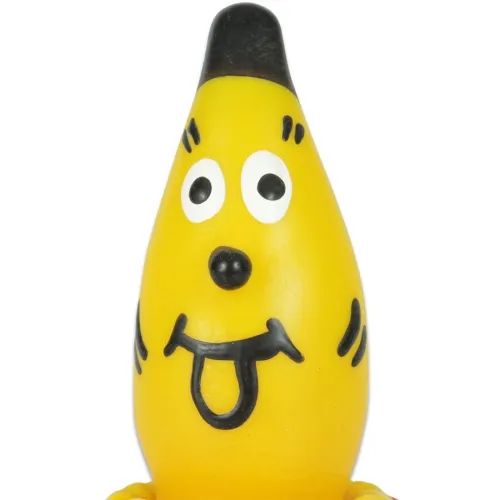 A yellow, banana-shaped figure with a face, large eyes and a protruding tongue, wears a black cap.