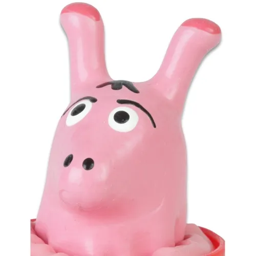 Pink toy figure with large eyes and two ears pointing upwards.