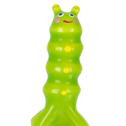 Green toy in the shape of a caterpillar with yellow spots and a smiling face.