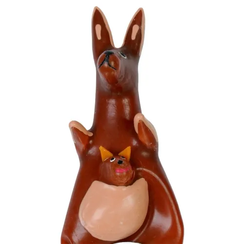 Ceramic kangaroo with baby in pouch, brown and orange, on a white background.