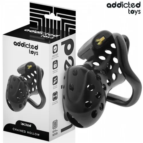 Black, perforated chastity cage set from Addicted Toys, pictured next to the packaging.