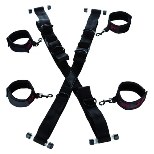 Black restraints with adjustable straps and buckles, arranged in an X-shape.