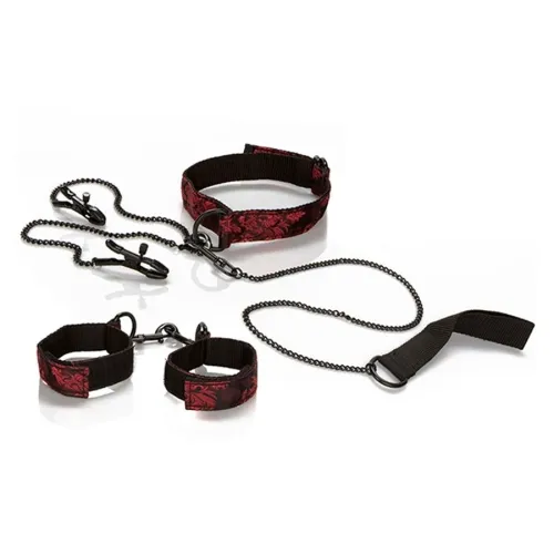 Schwarze und rote Handfesseln mit Ketten und Clips auf weißem Hintergrund.