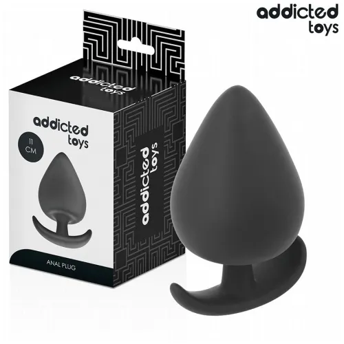 Black anal plug from Addicted Toys, 11 cm, next to the packaging.