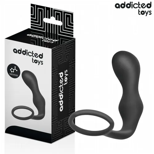 Schwarzes Sexspielzeug mit Ring neben Verpackung von "addicted toys".