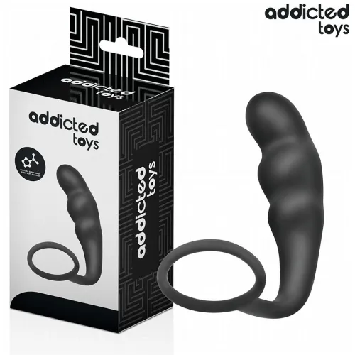 Schwarzes Sexspielzeug mit Ring, neben einer Verpackung mit der Aufschrift "addicted toys".