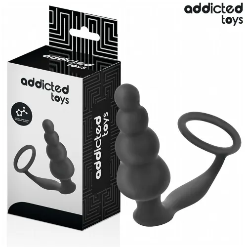 Schwarzes Sexspielzeug mit Ringgriff neben Verpackung von "addicted toys".