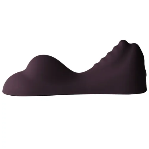 Dark purple, wavy cushion with an irregular surface, photographed from the side.