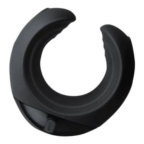 Black, semicircular object with a smooth surface and a small button on the underside.