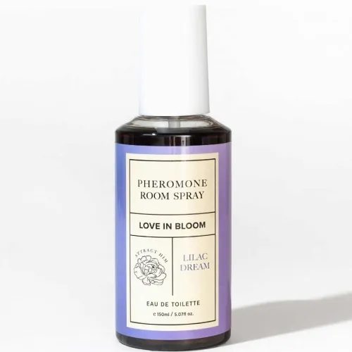Purple room fragrance spray bottle with the inscription "Pheromone Room Spray, Love in Bloom, Lilac Dream, Eau de Toilette".