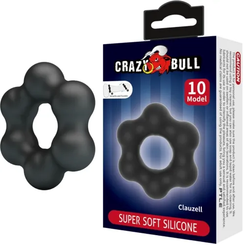 Black silicone ring in the shape of a flower next to a package labeled "Crazy Bull Super Soft Silicone".