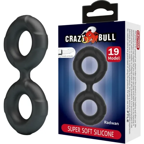 Black silicone ring in the shape of a figure eight next to packaging labeled "Crazy Bull" and "Super Soft Silicone".
