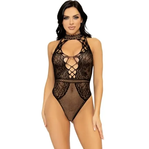 Woman in black lace bodysuit with lacing and mesh details against a white background.