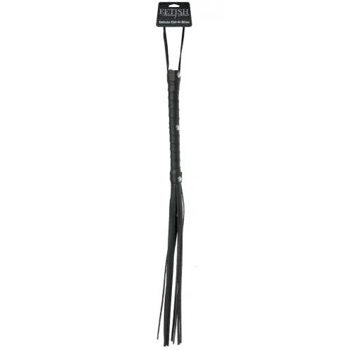 Black whip with multiple straps and a handle, label on top.