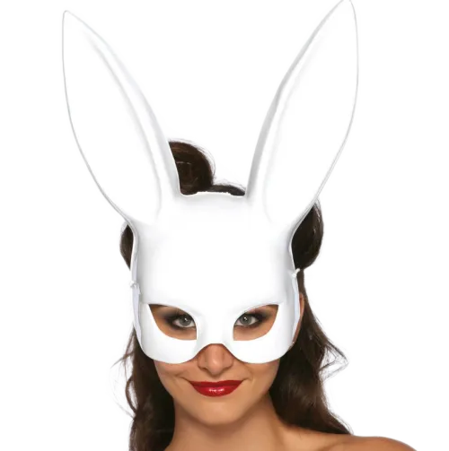 A woman wearing a white rabbit mask and red lips smiles at the camera.