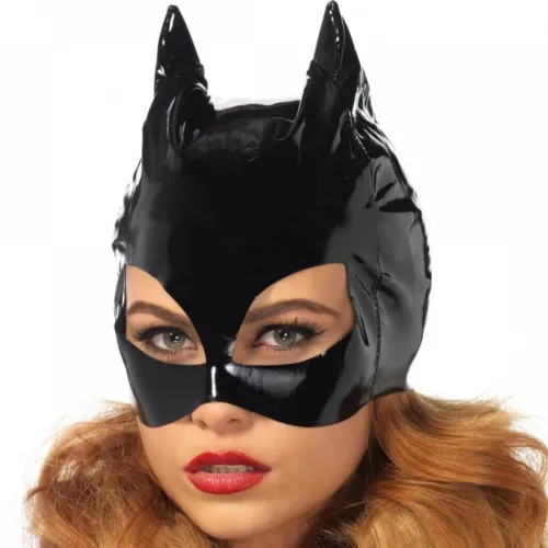 Woman wearing a black cat mask and red lips, looks directly into the camera.