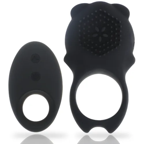 Two black silicone rings, one with bumps and the other with buttons, on a white background.