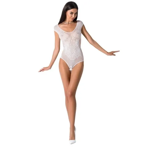 Woman in white lace bodysuit and white shoes posing against a white background.