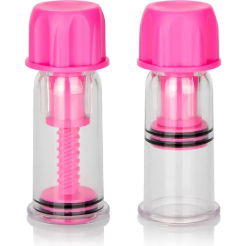 Zwei transparente Vakuumpumpen mit pinken Kappen und Schraubmechanismus, nebeneinander stehend.