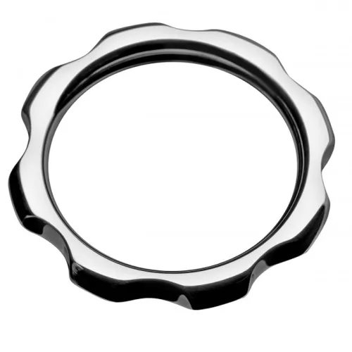Silver, jagged metal ring on a white background.