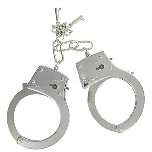 Silver handcuffs with two keys on a white background.