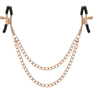 Zwei goldene Klemmen mit schwarzen Spitzen, verbunden durch eine doppelte Kette.
