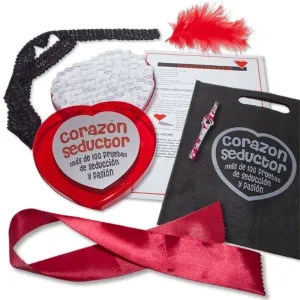 Heart-shaped box containing slips of paper, black bag, red ribbon, feather and blindfold, everything for seduction games.