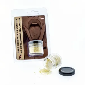 Kleines Glas mit gelbem Pulver, Verpackung mit Zeichnung einer Zunge und Text in Spanisch und Portugiesisch.