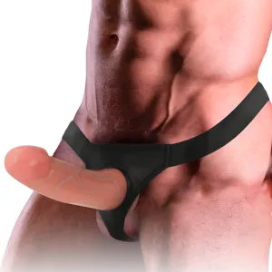 Ein Mann trägt einen schwarzen Jockstrap mit einem großen, realistisch aussehenden Dildo.