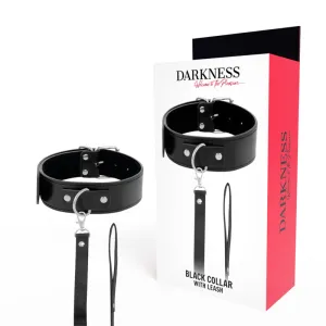 Schwarzes Halsband mit Leine und Verpackung mit der Aufschrift 