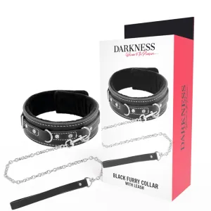 Schwarzes, pelziges Halsband mit Leine und Verpackung mit der Aufschrift 