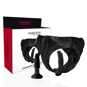 Schwarzer Strap-on mit austauschbarem Dildo und Verpackung der Marke 