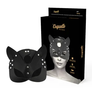 Schwarze Maske mit Katzenohren vor Verpackung mit Aufschrift 