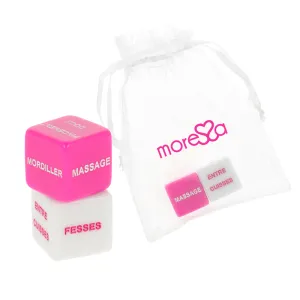 Two dice with French words, pink and white, next to a transparent bag with the 