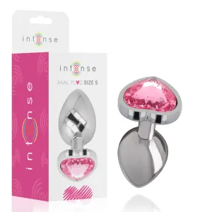 Silver anal plug with pink heart-shaped stone, packaging in the background, brand 
