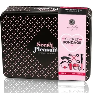 Black box with pink dots, inscription 