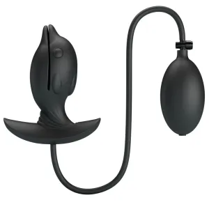 Schwarzes, fischförmiges Silikonspielzeug mit Pumpe und Schlauch, auf weißem Hintergrund.