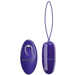Lila Vibrator mit Fernbedienung, beide mit glatter Oberfläche und silbernen Akzenten, auf weißem Hintergrund.
