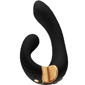 Black, curved massager with gold accents and honeycomb texture.