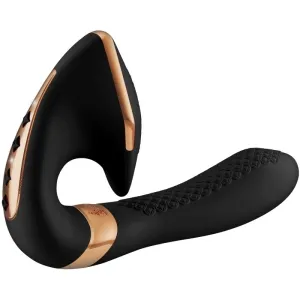 Black and gold ergonomic massager with textured handle and curved design.