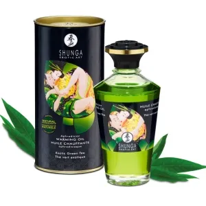 Grüne Flasche und Dose von Shunga Erotic Art Warming Oil, Exotic Green Tea, mit japanischem Kunstmotiv.