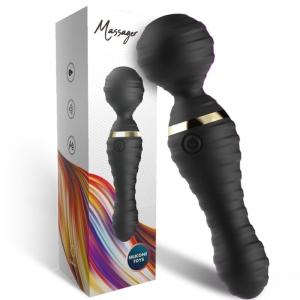 Black massage wand with gold accents, pictured next to its colorfully designed packaging.