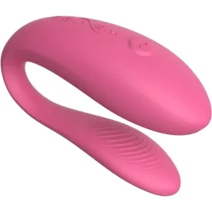 Rosa, U-förmiger Vibrator mit glatter Oberfläche und geripptem Ende, geeignet für intime Anwendungen.