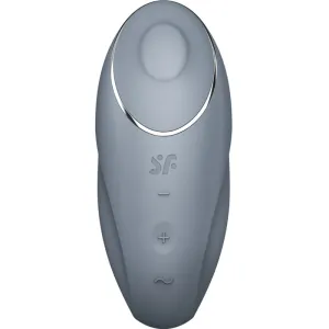 Grauer, ovaler Vibrator mit silbernem Rand und Bedienelementen für Intensität und Modus auf der Vorderseite.