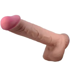 Ein hautfarbener Dildo mit rosa Spitze, realistisch gestaltet.