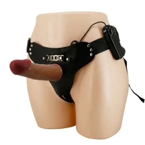 Schwarzer Strap-On-Gürtel mit realistischem Dildo und Fernbedienung auf einem Mannequin.