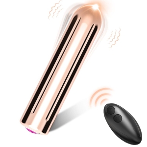 Goldener Vibrator mit Fernbedienung auf weißem Hintergrund.